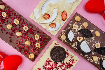 Natural handmade chocolate close-up on a bright background.