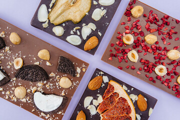 Natural handmade chocolate close-up on a bright background.