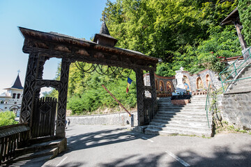 Fototapeta na wymiar The gate of Maramureș at Saint Ana Monastery, Rohia, Romania 2