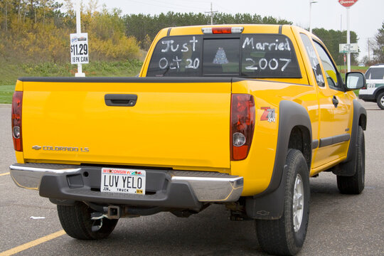 Just Married Announcement Printed In Rear Window Of Yellow Pickup Truck With Luv Yelo Wisconsin Plates. Baldwin Wisconsin WI USA