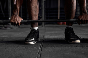 cropped Confident muscular afro american man training squats with barbells at gym. professional black fit bodybuilder workout with barbell, weightlifting. portrait. workout, sport, fitness concept