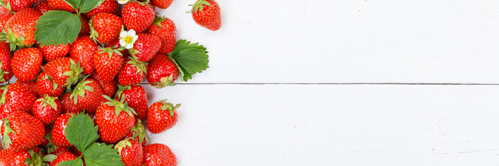 Strawberries berries fruits strawberry berry fruit with copyspace copy space on a wooden board...
