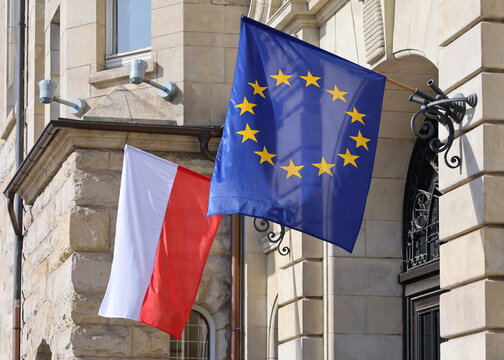 Polish and European Union flags waving together