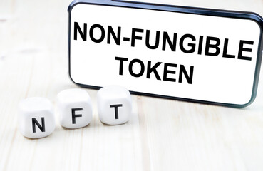 NFT or Non-Fungible token letters and dices, nft‘s are a blockchain market for art and collections