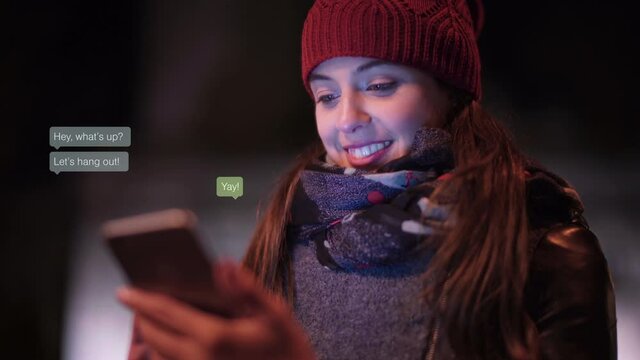 Casual young woman using smartphone at night. She is chatting with friends. Animations with texts appearing. 