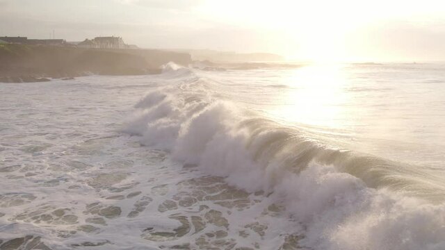 Ocean Waves Crashing Against the Rocky Shores of the Coastline