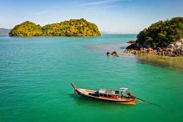 Fishing boat on the calm sea in Mu Koh Chang National Park, Ko, Thailand