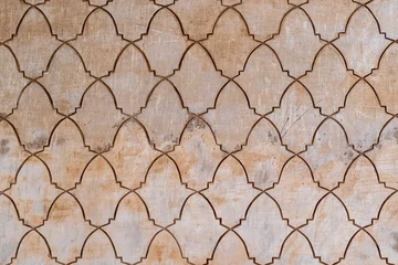 Tuinposter Geometrical arabesque tile pattern in a wall © JoseLuis