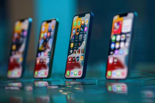 New Apple Iphone 13 smartphone on sale in apple shop. Iphone pro max 13, iphone 13, iphone mini.