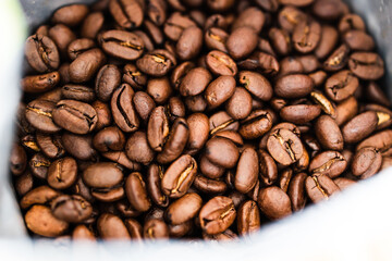 close-up of coffee beans in packaging bag, simple ingredients concept