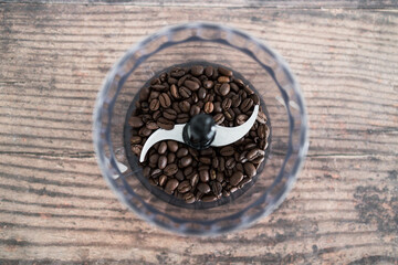 close-up of coffee beans food processor about to get grinded, simple ingredients concept