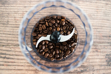 close-up of coffee beans food processor about to get grinded, simple ingredients concept