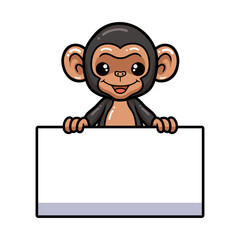 Cute baby chimpanzee cartoon with blank sign