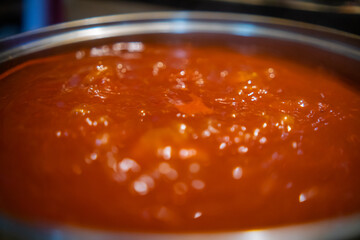 Delicious traditional Mexican pozole boiling in cooking pot