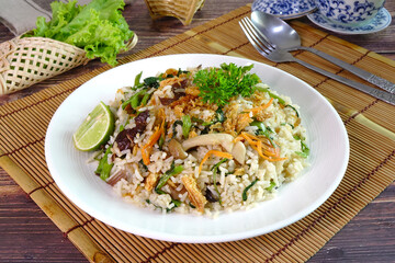 Vegetarian fried rice. Vegetarian fried rice with mixed mushroom, carrot and green vegetable. Vegetarian food