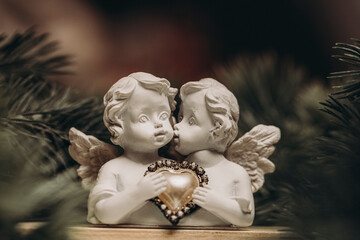 angel with heart. Angel statue