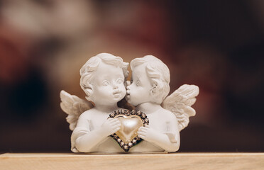statue of angel with a heart