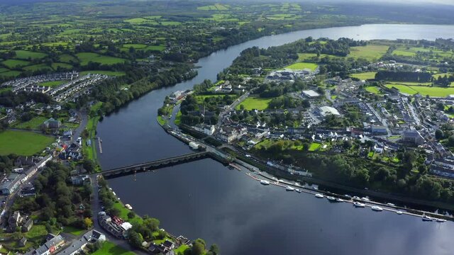 Killaloe, County Clare, Ireland, September 2021. Drone gradually descends towards the town while looking south towards Saint Flannan's Cathedral.
