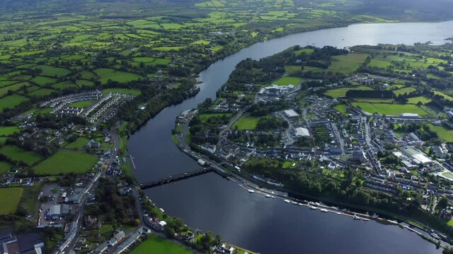 Killaloe, County Clare, Ireland, September 2021. Drone gradually descends towards the town from a high altitude looking south towards Saint Flannan's Cathedral.