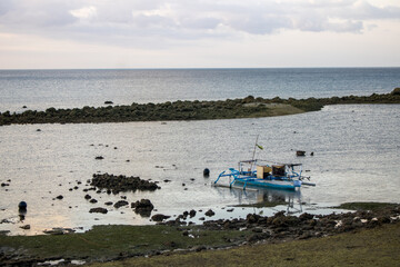 fishing boats on the shore