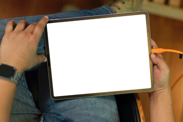Tablet blank screen mockup in male hands