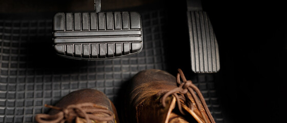 Shoes under brakes of the car will cause danger and accidents to the driver.