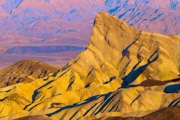 Fototapeta na wymiar Manly Beacon at sunrise, close up details, Zabriskie point in Death Valley National Park, California
