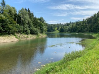 Fototapeta premium Artificial reservoir Lake Lokve or Artificial accumulation Lokvarsko Lake - Gorski kotar, Croatia (Lokvarsko jezero ili umjetno akumulacijsko Omladinsko jezero, Lokve - Gorski kotar, Hrvatska)