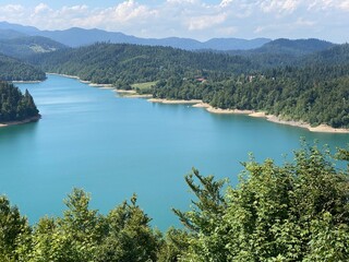 Obraz premium Artificial reservoir Lake Lokve or Artificial accumulation Lokvarsko Lake - Gorski kotar, Croatia (Lokvarsko jezero ili umjetno akumulacijsko Omladinsko jezero, Lokve - Gorski kotar, Hrvatska)