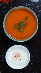 Lamb soup with rice, vegetables and cup of sour yogurt