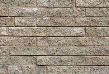 Gray stone wall. A fragment of a wall made of brick and mortar .Space for the text.