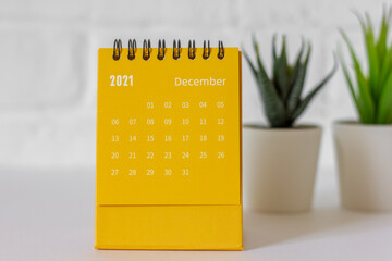 December 2021 is on the calendar.Desktop flip calendar .Hello December.