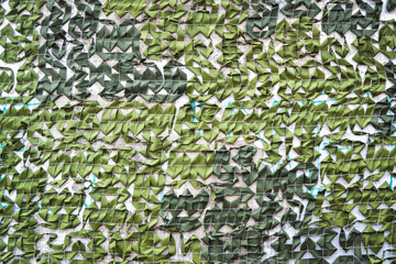 Military camouflage net, hunter net background.