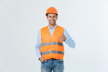 Happy young construction workers in hard hats on a white background.
