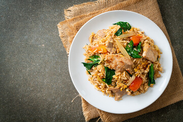 Fried rice with pork on plate