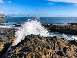 Malibu coast with crashing wave