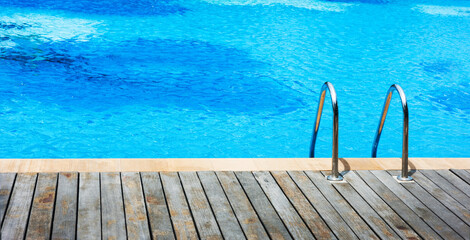Fototapeta na wymiar Empty swimming pool with stair at hotel