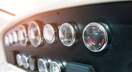 Detail of dashboard instruments on yacht