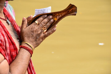 TARPAN - A Hindu ritual, the sacrament of offering drinking water to the manes. This is well...