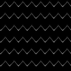White chalk zigzag on a black background