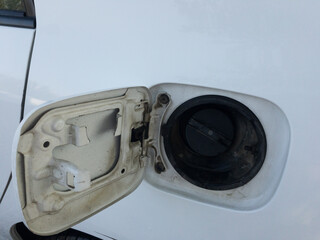 Car fuel door open for filling petrol