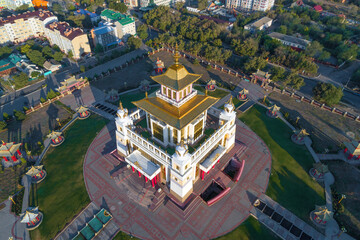 Top view of the Buddhist temple "Golden Abode of Buddha Shakyamuni" on a sunny morning (aerial photography). Elista, Russia