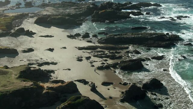 Aerial: Glass Beach at Fort Bragg on Mendocino Coastline, California, USA