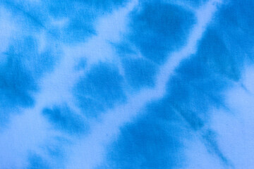 Close up tie dye fabric pattern. Hand made texture.
