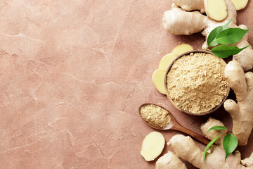 Composition of fresh and dry ginger on a textured background.