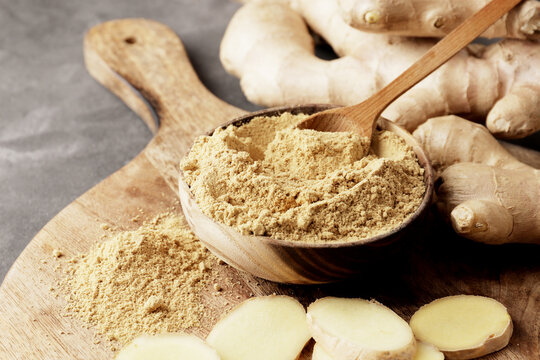 Dry and fresh ginger close-up on a textured background. Spice, ingredient.