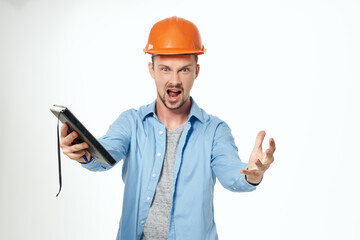 Man in a blue shirt emotions professional light background