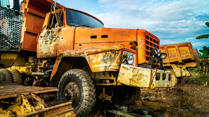 Broken old rusty truck in the junkyard