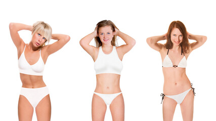 Three closeup portraits of slim young women wearing white bikinis, isolated on white studio...