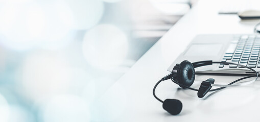 Headset and customer support equipment at call center ready for actively service . Corporate business help desk and telephone assistance concept . - obrazy, fototapety, plakaty